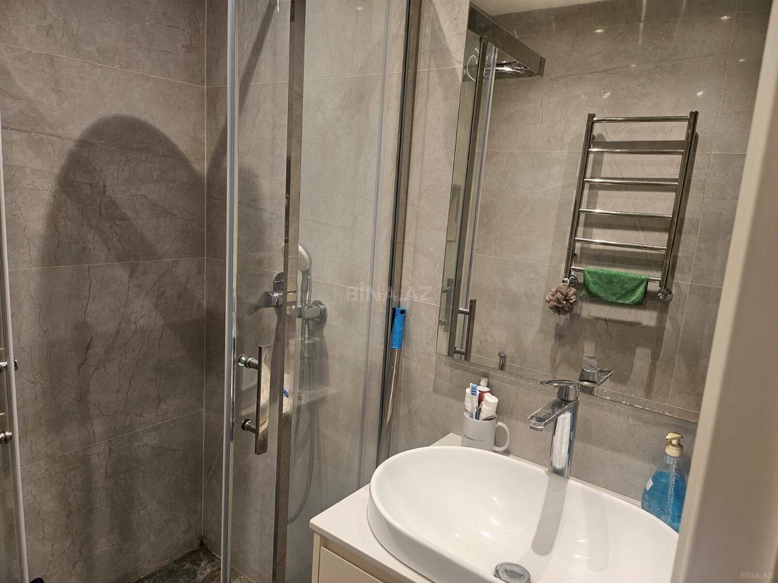 3 otaqlı yeni tikili 90 m², Bakmil m. - əsas şəkil